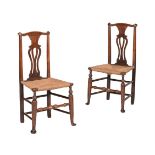 A PAIR OF GEORGE III ELM AND RUSH SEATED SIDE CHAIRS