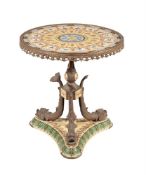 A FRENCH PORCELAIN, POTTERY, AND GILT METAL MOUNTED GUERIDON TABLE IN EMPIRE STYLE