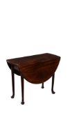 A GEORGE II WALNUT DROP LEAF TABLE