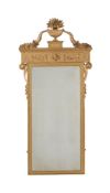 A GILTWOOD AND COMPOSITION PIER MIRROR IN NEO-CLASSICAL TASTE