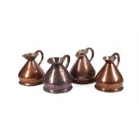 A GROUP OF FOUR ASSOCIATED VICTORIAN COPPER 'HAYSTACK' GALLON MEASURES