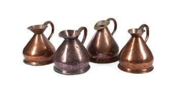 A GROUP OF FOUR ASSOCIATED VICTORIAN COPPER 'HAYSTACK' GALLON MEASURES