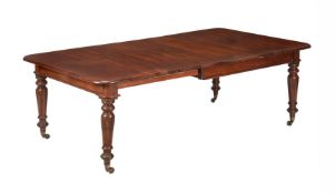 A VICTORIAN MAHOGANY EXTENDING DINING TABLE