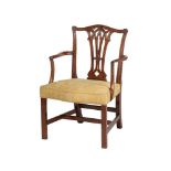 A GEORGE III MAHOGANY OPEN ARMCHAIR