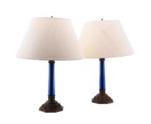 A PAIR OF BLUE GLASS AND PATINATED METAL COLUMNAR TABLE LAMPS
