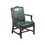 A MAHOGANY AND GREEN LEATHER UPHOLSTERED ARMCHAIR IN GEORGE III STYLE