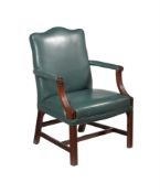 A MAHOGANY AND GREEN LEATHER UPHOLSTERED ARMCHAIR IN GEORGE III STYLE