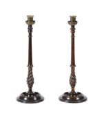 A PAIR OF MAHOGANY AND BRASS MOUNTED TABLE CANDLESTICKS IN SCOTTISH 18TH CENTURY TASTE