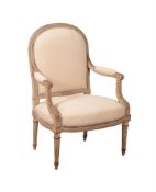 A PAINTED AND UPHOLSTERED FAUTEUIL IN LOUIS XVI STYLE