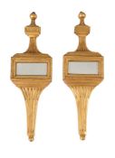 A PAIR OF GILTWOOD AND MIRRORED WALL ORNAMENTS IN GEORGE III STYLE