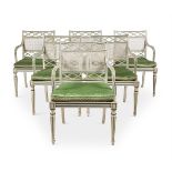 A SET OF EIGHTEEN CREAM AND GREEN PAINTED DINING CHAIRS, DESIGNED BY OLIVER MESSEL