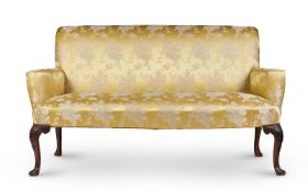 A MAHOGANY AND UPHOLSTERED SOFA IN GEORGE II STYLE, 19TH CENTURY