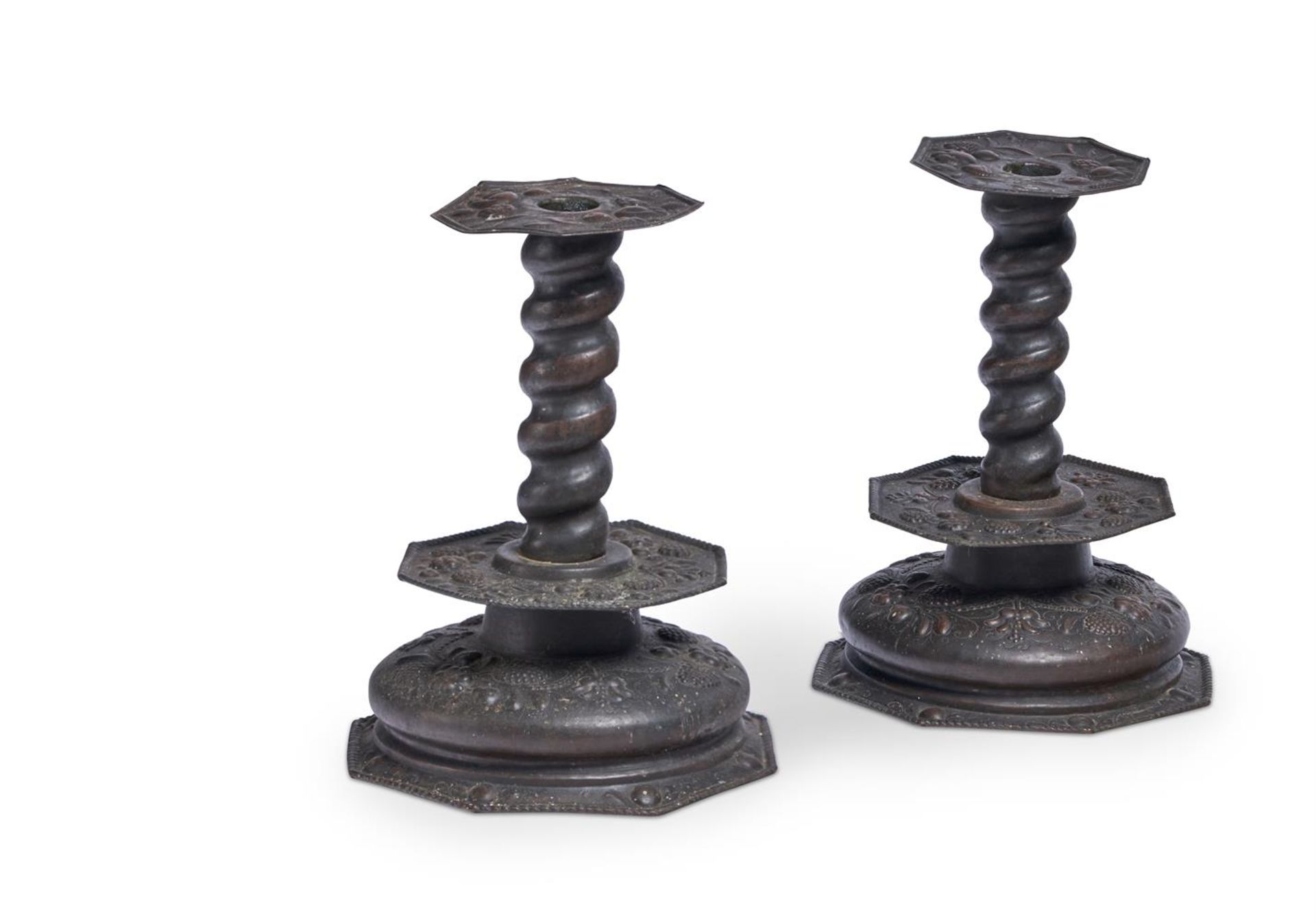 A PAIR OF DUTCH PRESSED METAL CANDLESTICKS, LATE 19TH CENTURY