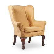 A PROVINCIAL STAINED OAK AND BEECH ARMCHAIR IN GEORGE II STYLE, 19TH CENTURY
