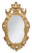 A GILTWOOD AND COMPOSITION WALL MIRROR IN GEORGE III STYLE, 19TH CENTURY