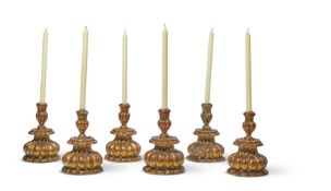 A SET OF SIX GILTWOOD CANDLESTICKSLATE 19TH CENTURYEach of squat lobed