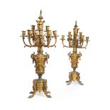 A PAIR OF NAPOLEON III GILT BRONZE AND METAL NINE BRANCH TABLE CANDELABRA, CIRCA 1870