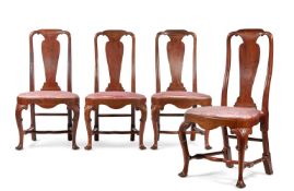 A SET OF FOUR GEORGE II WALNUT DINING CHAIRS, CIRCA 1730