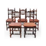 A SET OF FOUR WALNUT SIDE CHAIRS LATE 17TH/ EARLY 18TH CENTURY AND LATERThe arched toprails suppor