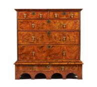 A WALNUT CHEST ON STAND, CIRCA 1740 AND LATER