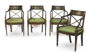 A SET OF FOUR EBONISED PARCEL GILT AND PAINTED ARMCHAIRS, CIRCA 1810 AND LATER