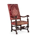 A CONTINENTAL WALNUT HIGH BACK ARMCHAIR, 18TH CENTURY