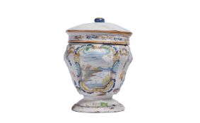 A NORTHERN ITALIAN FAIENCE STORAGE JAR AND COVER, 19TH CENTURY