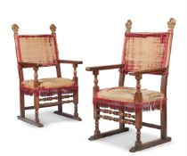 A PAIR OF ITALIAN WALNUT AND PARCEL GILT ARMCHAIRS, EARLY 18TH CENTURY