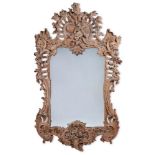 A FINELY CARVED PINE PIER MIRROR, EARLY 19TH CENTURY
