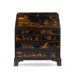 A GEORGE III BLACK LACQUER AND POLYCHROME JAPANNED BUREAU, CIRCA 1780