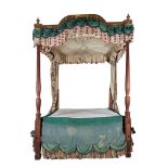 A MAHOGANY FOUR POSTER IN THE MANNER OF GEORGE HEPPLEWHITE, EARLY 19TH CENTURY AND LATER