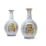 A PAIR OF ITALIAN MAIOLICA ARMORIAL BOTTLE VASES, 18TH CENTURY