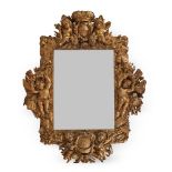 A RARE CARVED GILTWOOD MIRROR