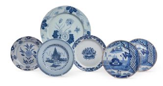 A GROUP OF ENGLISH DELFT BLUE AND WHITE PLATES To include a pair of plates with oriental scenes 22.