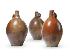 THREE SUBSTANTIAL GERMAN SALT-GLAZED STONEWARE FLASKS, 17TH CENTURY