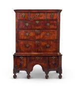 A WALNUT CHEST ON STAND, SECOND QUARTER 18TH CENTURY AND LATER