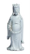 A BLANC DE CHINE FIGURE OF A STANDING SCHOLAR, GUANYINQING DYNASTY