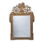 A NORTH ITALIAN GILTWOOD AND COMPOSITION WALL MIRROR, EARLY 19TH CENTURY