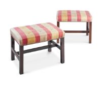 A PAIR OF MAHOGANY AND UPHOLSTERED STOOLS IN GEORGE III STYLE