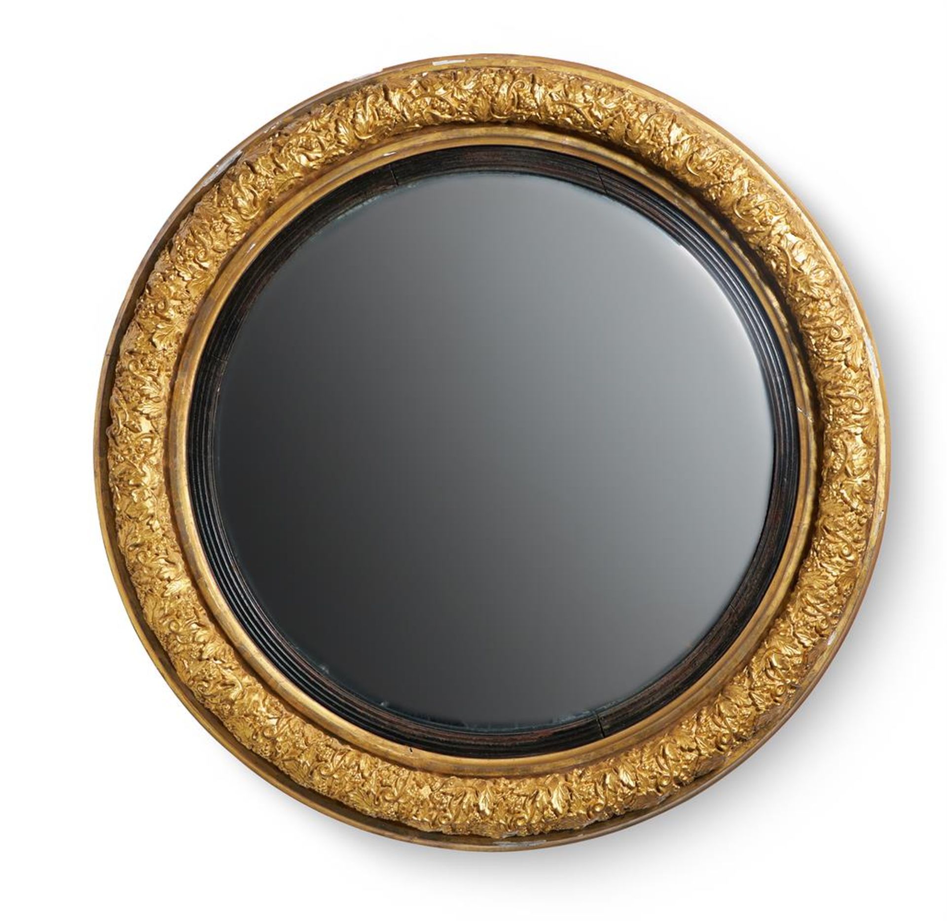 A REGENCY GILTWOOD AND COMPOSITION CONVEX WALL MIRROR, CIRCA 1820