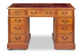 AN EDWARDIAN OAK TWIN PEDESTAL DESK, EARLY 20TH CENTURY