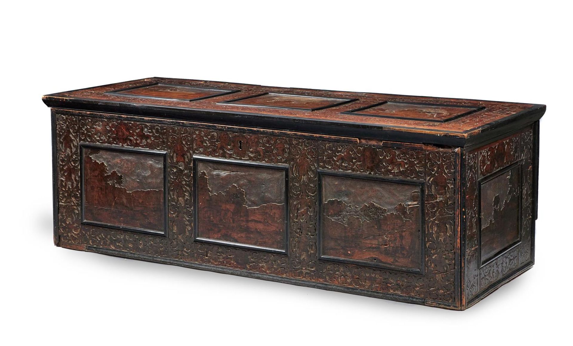 AN ITALIAN CARVED CEDARWOOD , POKERWORK AND EBONISED CHEST ADIGE, LATE 17TH CENTURY