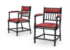 Y A PAIR OF EBONISED AND IVORY MOUNTED ARMCHAIRS, SECOND QUARTER 19TH CENTURY