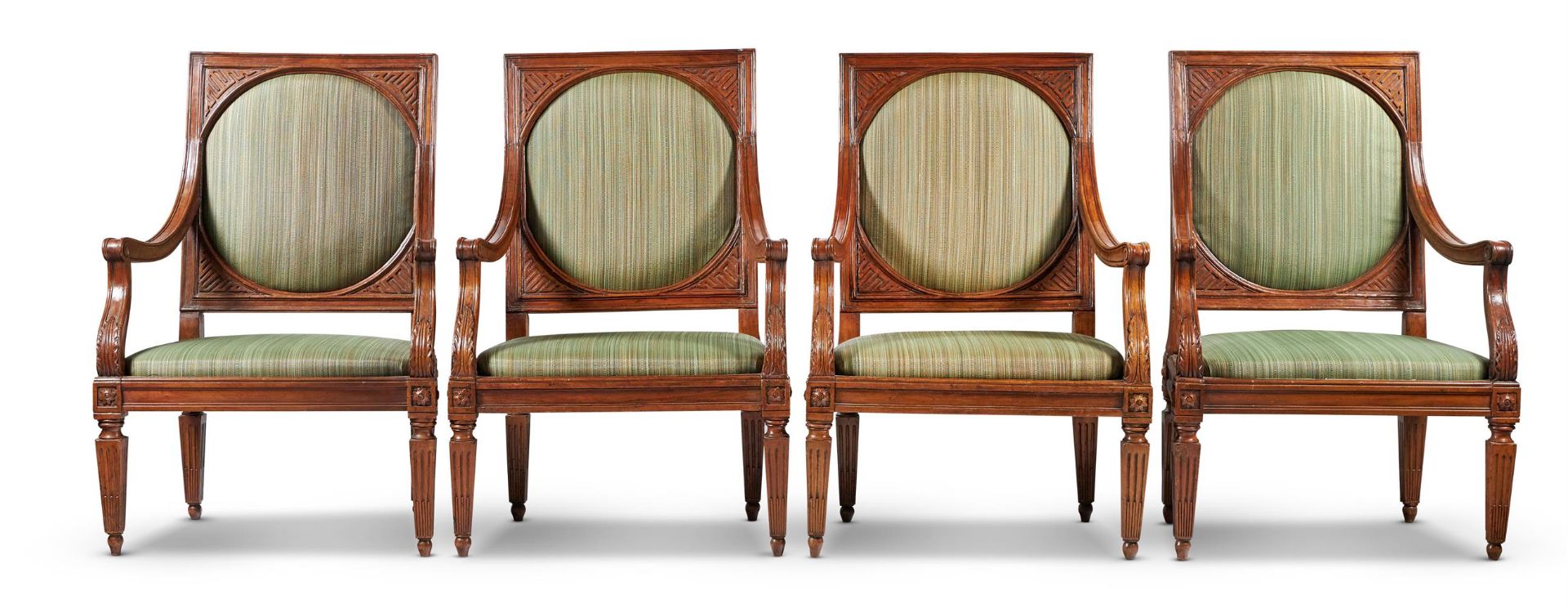 A SET OF SIX NORTH ITALIAN CARVED WALNUT ARMCHAIRS, CIRCA 1790