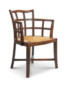 A STAINED OAK ARMCHAIRBY HEALS