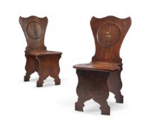 A PAIR OF GEORGE III OAK HALL CHAIRS, THIRD QUARTER 18TH CENTURY