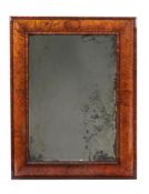 A MATCHED PAIR OF CHARLES II KINGWOOD OYSTER VENEERED WALL MIRRORS, CIRCA 1685