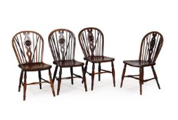 A HARLEQUIN SET OF FOUR ELM, ASH, AND FRUITWOOD WINDSOR ARMCHAIRS