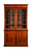 A GEORGE III MAHOGANY, SATINWOOD AND MARQUETRY BOOKCASE