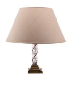 A CLEAR AND CRANBERRY GLASS TWIST TABLE LAMP